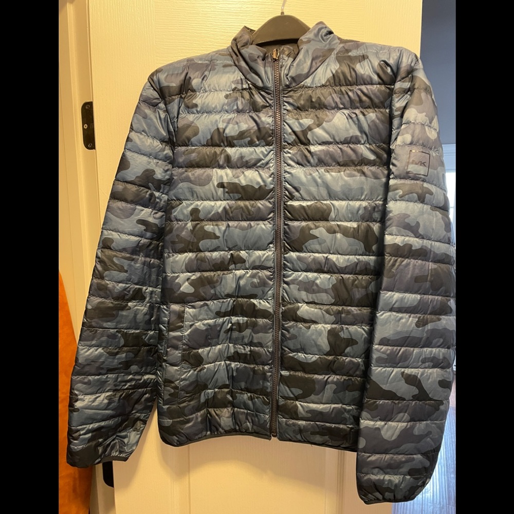 Reversible camo jacket.  Other side is solid navy blue
